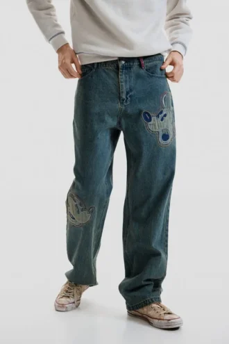 Jeans med Disney™-lappar